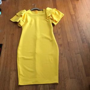 Yellow dress. Ruffle sleeves. Beautiful